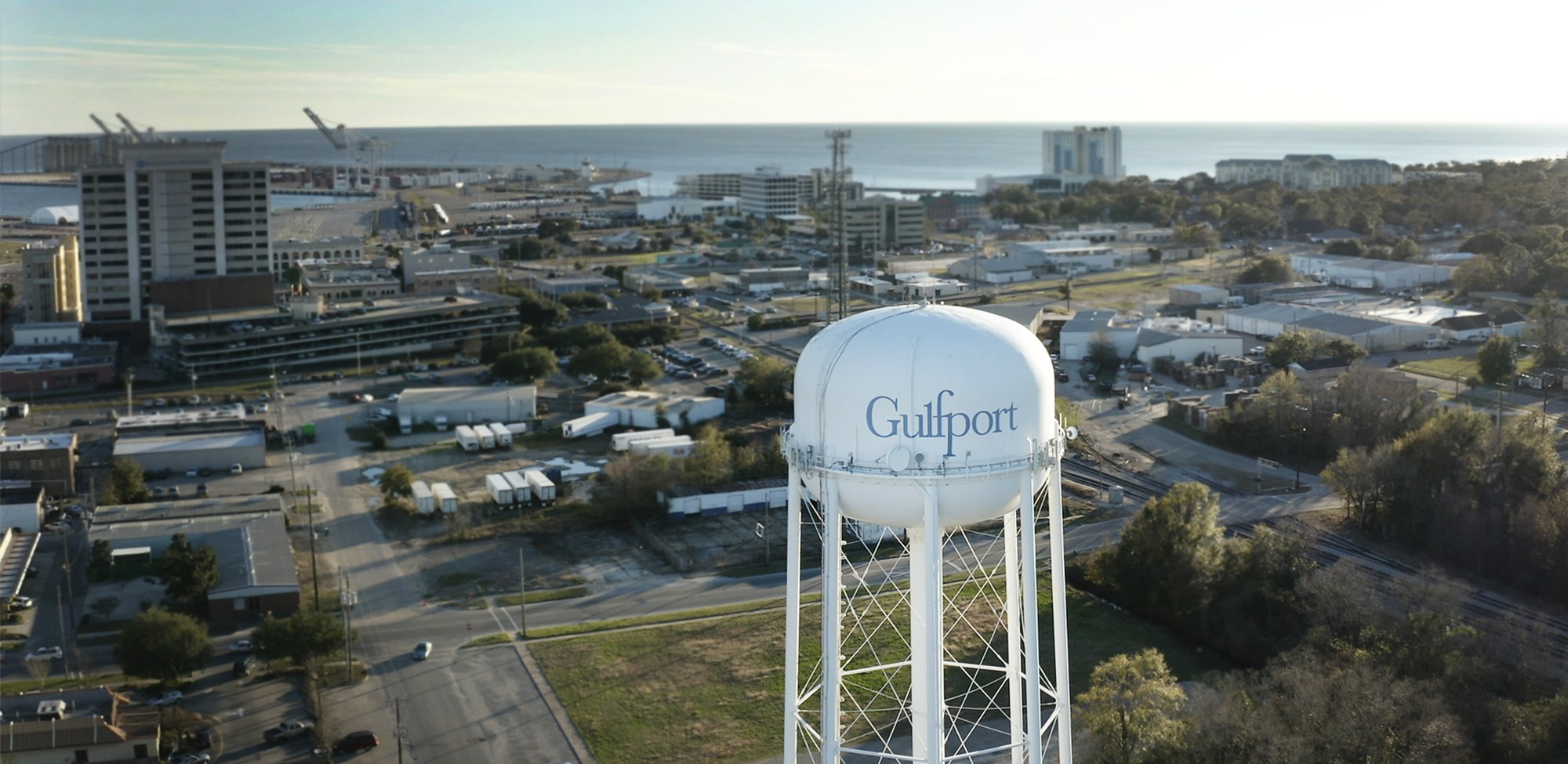 The Gulfport water tower with the port and Gulf beyond